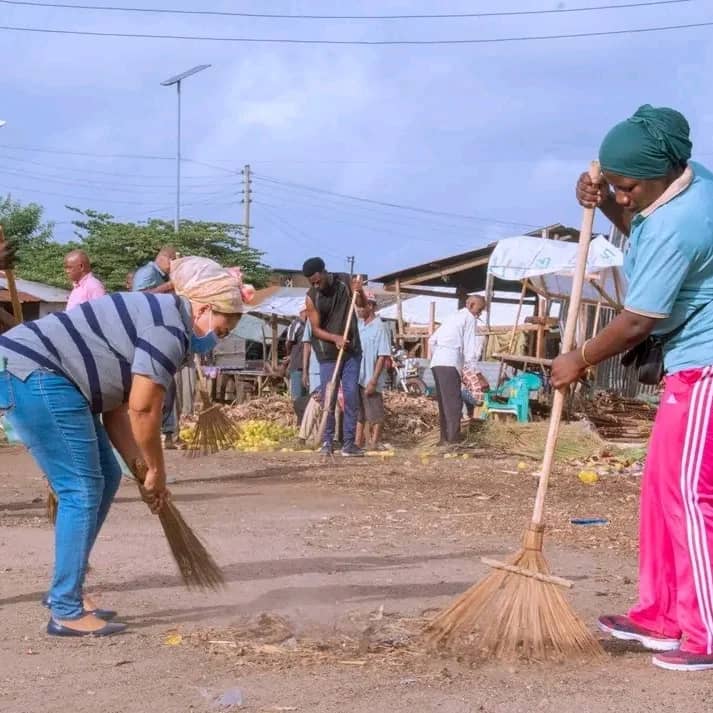 Coastal cleanup removing debris from beach